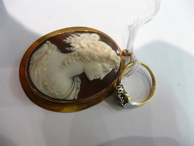 Lot 98 - A cameo pendant and a diamond three stone ring