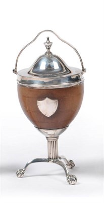 Lot 501 - A George III Silver Mounted Tripod Coconut Shell Basket and Cover, London 1799, the half-nut...