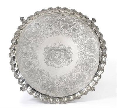 Lot 502 - A George III Armorial Tray, Ebenezer Coker, London 1767, of waved circular shape with beaded...