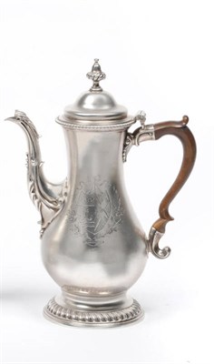 Lot 508 - A George III Coffee Pot, Charles Wright, London 1772, the gadrooned foot rising to a baluster...