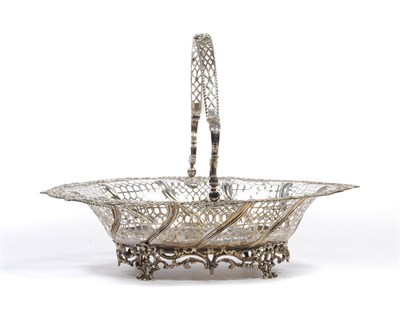 Lot 510 - A George III Cake Basket, Edward Aldridge, London 1767, the shaped oval basket with wrythen...