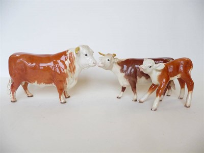 Lot 249 - A Beswick Hereford Bull, model No. 949, 14.6cm high; Hereford Cow, model No. 948, 12.7cm (restored)