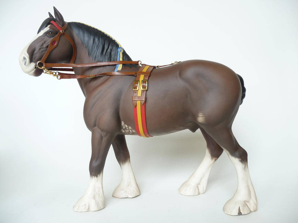 Lot 273 - A Beswick Clydesdale Horse, model No. 2465 in show harness, brown matt, 27.8cm high