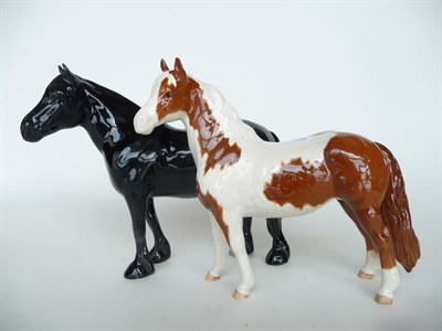 Lot 279 - A Beswick Dales Pony 'Maisie', model No. 1671, black gloss, 16.5cm high and a Skewbald Pinto...