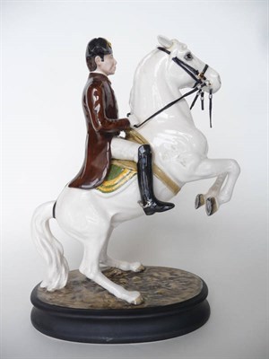 Lot 286 - A Beswick Rearing Lipizzaner Horse with Rider, model No. 2467 (second version-tail and legs...