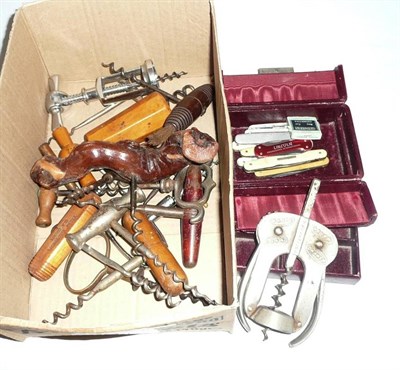 Lot 306 - A collection of corkscrews and penknives