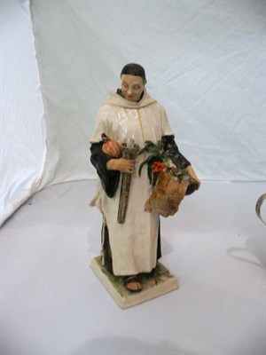 Lot 320 - S K Copel slip cased earthenware figure of a monk, signed and dated 1923