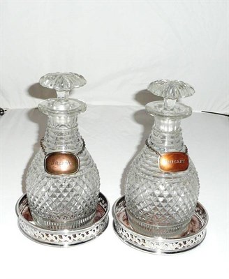 Lot 322 - Pair of coasters and a pair of decanters