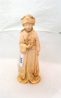 Lot 325 - A Japanese one piece ivory carved figure of Bijin with fan