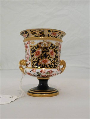 Lot 330 - A Royal Crown Derby miniature urn