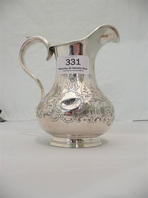 Lot 331 - Victorian silver pear shaped cream jug with engraved decoration