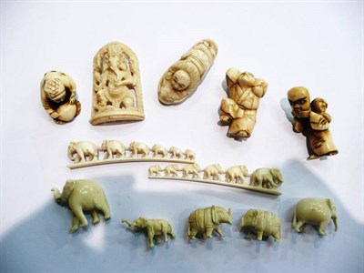 Lot 337 - Twelve assorted pre-1947 carved ivory netsukes, animals and a 'Gamesh' panel, mainly Japanese...