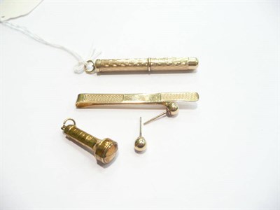 Lot 357 - A 9 carat gold toothpick, tie bar, earrings and seal fob