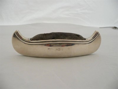 Lot 382 - A silver pin cushion in the form of a canoe, Birmingham mark