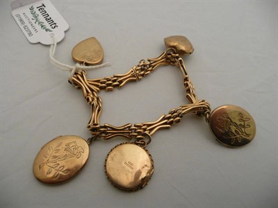 Lot 397 - Gate bracelet hung with lockets