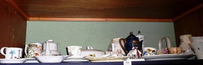 Lot 402 - A Carltonware powder blue ground coffee pot and cover and a quantity of other ceramics on a shelf