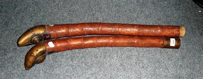 Lot 445 - Two Eastern bamboo pipes