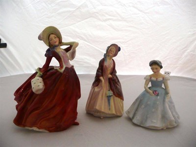 Lot 455 - Three Royal Doulton figures "Autumn Breezes" HN1934, "Paisley Shawl" HN1988 and "The...