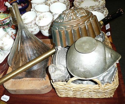 Lot 457 - Tray of kitchenalia comprising German and English chocolate moulds, copper jelly mould, wooden...