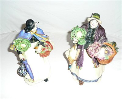 Lot 473 - Two slip case pottery figures in the manner of Charles Vyse (some damage)