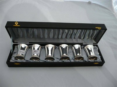 Lot 487 - Six modern silver waisted small beakers, cased