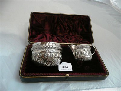 Lot 494 - Cased silver sugar bowl and cream jug, Hilliard & Thomason, Chester & Birmingham 1898-99