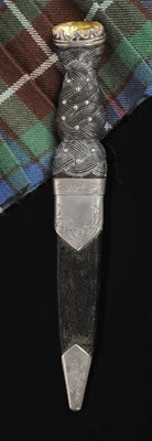 Lot 539 - A Victorian Scottish Officer's Skean Dhu, the scalloped back blade with single fuller, marked...