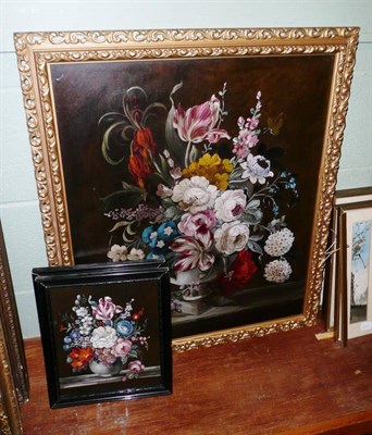 Lot 550 - A gilt-framed oil on board still life together with two smaller examples