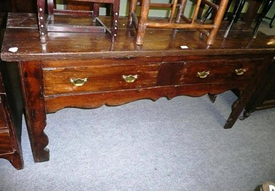 Lot 656 - A pine dresser base fitted two drawers