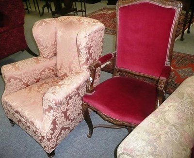 Lot 662 - Upholstered wing armchair and a French-style elbow chair