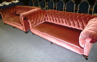 Lot 672 - Matched pair of Victorian Chesterfields upholstered in pink