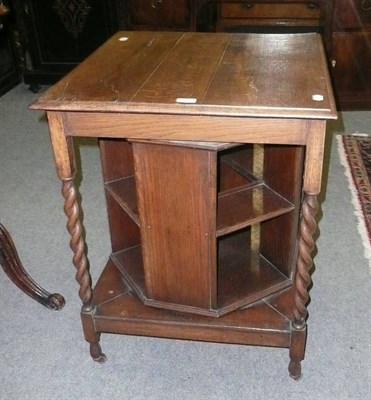 Lot 683 - Late Victorian oak revolving bookcase