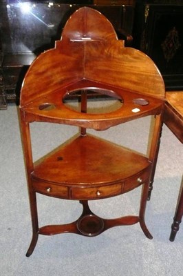 Lot 686 - Georgian mahogany corner washstand