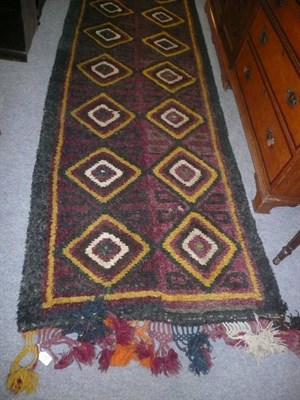 Lot 693 - Purple ground fringed runner