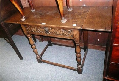 Lot 703 - A reproduction side table in 17th century style