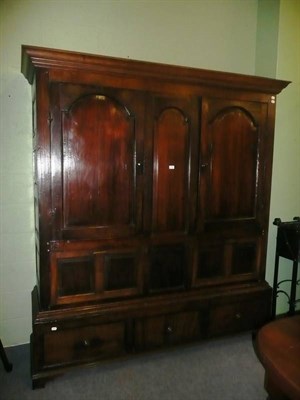 Lot 722 - An 18th century oak large press cupboard