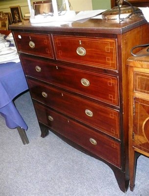 Lot 734 - 19th century cross-banded mahogany four height chest