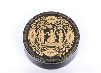 Lot 584 - A Neapolitan Gold Inlaid Tortoiseshell Snuffbox, circa 1750, circular, worked with three figures in