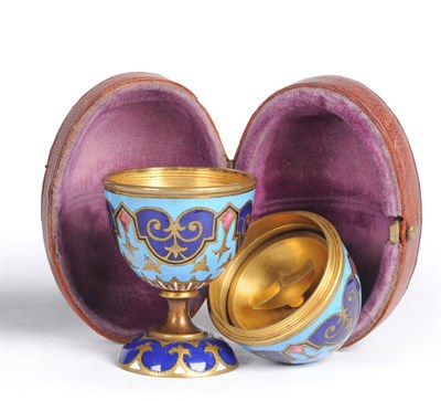 Lot 588 - A Pair of Russian Gilt Metal and Enamel Travelling Egg Cups, late 19th century, each of typical...