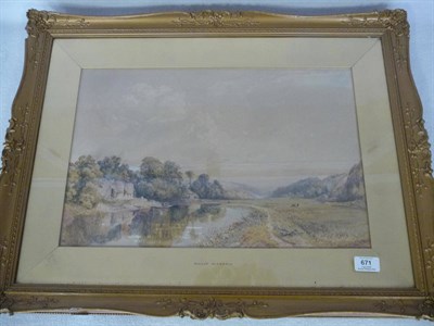 Lot 671 - Philip Mitchell R.I. (1814-1896) River Landscape with Cattle Grazing in a Meadow, buildings amongst