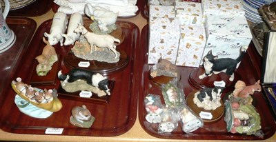 Lot 39 - Two Beswick pigs, Border Fine Arts goat, resin Beatrix Potter figures and other models on two trays