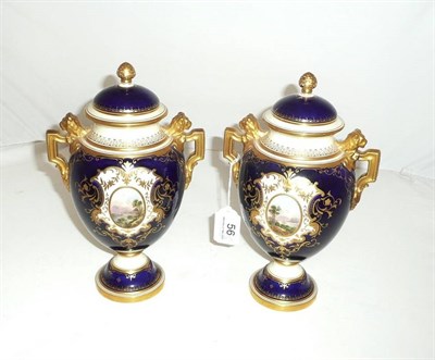 Lot 56 - A pair of Coalport landscape painted vases and covers a/f
