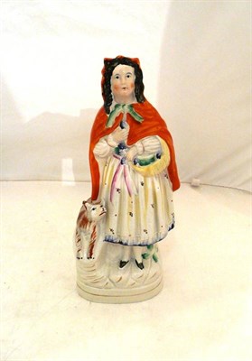 Lot 58 - Staffordshire figure of Red Riding Hood