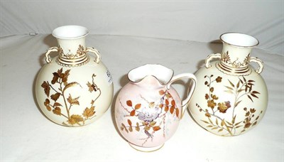 Lot 62 - A pair of Derby vases with gilt floral decoration and a Derby pink ground jug (3)