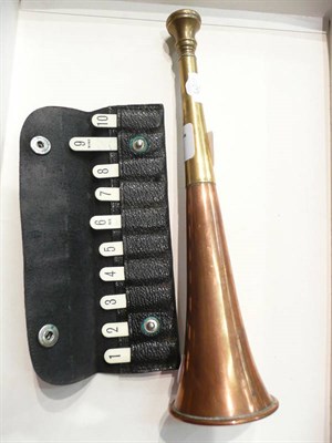 Lot 71 - A hunting horn and a set of butt pegs