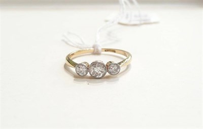 Lot 90 - A graduated diamond three stone ring