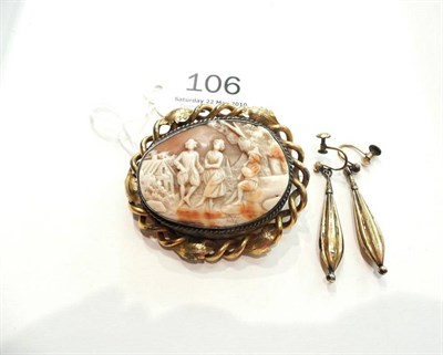 Lot 106 - A cameo brooch and a pair of drop earrings