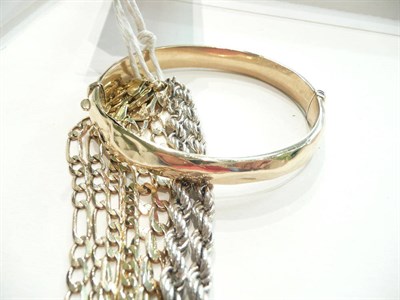 Lot 108 - 9ct hollow gold bangle and four chains