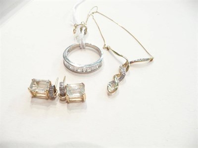 Lot 111 - A 9ct gold fancy diamond-set necklace, a 9ct white gold cubic zirconia ring and a pair of...