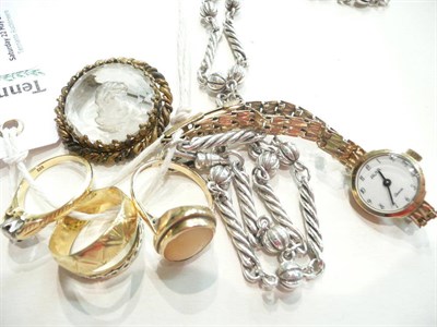 Lot 118 - 18ct band ring, 9ct gold lady's wristwatch, three rings, a brooch and a watch chain stamped...